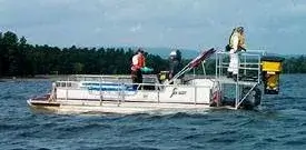 boat on the lake during treatment process